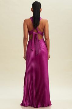 Product Details: Elevate your evening attire with our stunning Pleated Cross Over Maxi Dress. This elegant dress features a sophisticated cross-over halter neckline that beautifully accentuates the shoulders and a delicate keyhole detail at the front. The back showcases an eye-catching design with a tie that adds a touch of allure. The fully pleated skirt flows gracefully with every step, offering a timeless and chic silhouette. Perfect for formal events, weddings, or any special occasion, this Magenta Maxi Dress, Magenta Dresses, Magenta Bridesmaid Dresses, Fuschia Bridesmaid Dresses, Moh Dress, Magenta Dress, Casual Beach Wear, Dress Colors, Bridesmaid Dress Colors