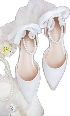 White Pearl Embellished Wedding Shoes For Bridesmaids, Pearl Embellished Closed Toe Wedding Shoes For Bridal Shower, Summer Wedding Flats With Ankle Strap, Summer Wedding Ankle Strap Flats, Pearl White Ankle Strap Wedding Shoes, White Flat Bridesmaid Wedding Shoes, Pearl Wedding Shoes With Pointed Toe, Pearl Embellished Wedding Flats, Elegant Flat Heel Wedding Shoes For Bride