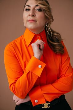 Welcome to DaDonnaBlouses Etsy store! Elevate your wardrobe with my exquisite collection of women's dress shirts, including my signature French Cuff Blouse. Meticulously crafted in my own factory, specializing in the art of shirtmaking. Indulge in sophistication with my  French cuff shirt for women, meticulously crafted from premium-grade cotton fabric with a touch of elastane. This high-quality blend ensures a comfortable fit and exceptional durability, making it a staple piece in your wardrobe for years to come. DaDonnaBlouses button-down shirt for women features a high collar and delicate details, exuding elegance and style. The vibrant, trend-forward color adds a pop of personality to any outfit, whether you're heading to the office or a formal event. Experience the perfect balance of Fitted Blouse With Button Cuffs, Luxury Blouse With Spread Collar And Buttons, Luxury Spread Collar Blouse With Buttons, Luxury Office Tops With Buttons, Luxury Office Top With Buttons, Luxury Buttoned Office Tops, Luxury Blouse With Button Cuffs And Spread Collar, Luxury Button-up Top With Button Cuffs, Luxury Workwear Blouse With Buttons