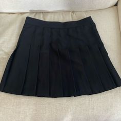 Size Xl, No Tags But Never Worn. La Apparel Black Pleated Skirt Black Mini Tennis Skirt With Lining, Black Mini Pleated Skirt With Lining, Black Lined Mini Pleated Skirt, Black Pleated Mini Skirt For School, Black Pleated School Uniform Mini Skirt, Black Relaxed Pleated Skort, Black Pleated Relaxed Skort, Black School Uniform Mini Skirt, School Black Pleated Lined Skirt