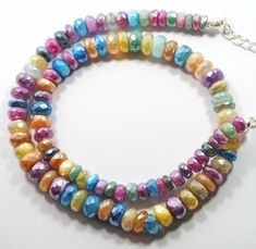 Genuine Multi Coated Moonstone Gemstone beads Faceted Roundel Shape Necklace 5.5-8.5 MM Approx 1 strand 16 Inch  AAA Quality Necklace Quality = AAA Strand length: approximately 16 Inch Stone Size:  5.5-8.5 MM Approx Stone Shape: Roundel Style =  Faceted Colors = Multi Colors Moonstone Necklace Lock = Silver Lock Hole size: approximately 0.60 mm Bulk wholesale pricing is available convo me for information on this listing or any others in my shop. We are continuously adding new products in our store. So keep coming back to see more great deals. CLICK BELOW TO CHECK ALL OUR BEAUTIFUL RONDELLES https://www.etsy.com/in-en/shop/JaipurGemsBeadsCo?ref=search_shop_redirect Have questions? Please contact us via messaging option. We will resolve your query within maximum 24 hours. Private Assistance Disco Necklace, Necklace Lock, Gemstone Beads Wholesale, 16 Inch Necklace, Necklace Beads, Moonstone Necklace, Green Amethyst, Fire Opal, Gemstone Necklace