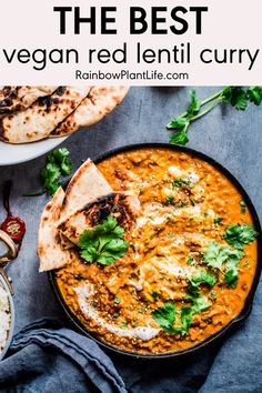 vegan and gluten - free red lentil curry with pita bread on the side