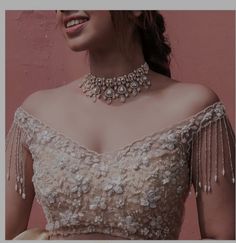 Lengha For Sangeet Indian Weddings, One Sleeve Blouse Design, Blouse Design For Net Lehenga, Off Shoulder Lengha Blouse, Sangeet Lehenga Blouse Design, Off Shoulder Dress Jewelry Ideas, Bridal Lengha Blouse Designs, White Blouse Ideas, Net Lehenga Blouse Designs