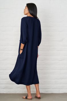 Tunic - Navy Gauze Dress With Pockets Solid Color Tunic Dress With Relaxed Fit, Blue Tunic Dress With Relaxed Fit, Blue Midi Dress With 3/4 Sleeve For Beach, Blue Relaxed Fit Tunic Dress, Relaxed Fit Tunic Dress Unlined, Indigo Long Sleeve Dresses For The Beach, Indigo Long Sleeve Beach Dress, Indigo Relaxed Fit Dress For Daywear, Blue Long Relaxed Fit Dress