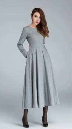 Gray Swing Wool Dress perfect for any occasion. Stay stylish and comfortable all day long. ✨ 

SKU 1616 
Link in bio 

#Fashion #WomensWear #GrayDress #SwingDress #WoolDress #Xiaolizihandmade Fitted A-line Maxi Dress For Fall, Long Winter Dress For Formal Occasions, Formal Long Dress For Winter, Elegant Full Skirt Dress For Fall, Elegant A-line Winter Maxi Dress, Formal Winter Maxi Dresses, Fall A-line Fitted Maxi Dress, Formal Full Skirt Dresses For Fall, Modest Formal Fall Maxi Dress