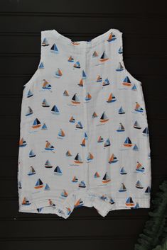 Sailboat Romper for Baby White Summer Bubble Romper For Beach, Casual Cotton Bubble Romper For Beach, Summer Blue Sleeveless Bubble Romper, Blue Sleeveless Summer Bubble Romper, Blue Summer Bubble Romper For The Beach, Blue Summer Bubble Romper For Beach, Sleeveless Cotton Bubble Romper For Vacation, Fun Summer Beach Bubble Romper, Sleeveless White Bubble Romper For Beach