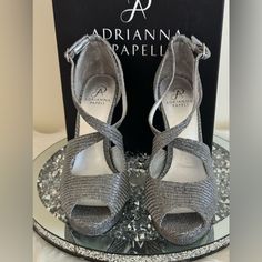 Elevate Your Style With These Stunning Adrianna Papell Rosalie High Heel Shoes. Crafted With Premium Quality Silver Leather, These Strappy Heels Feature A Metal-Themed Design That Adds A Touch Of Glamour To Any Outfit. The Shoes Are Brand New And Come In Their Original Box, Ready To Be Shipped To Your Doorstep. With A Us Shoe Size Of 9, These Heels Are Perfect For Women Who Want To Make A Bold Fashion Statement. The Pewter Color Complements Any Clothing Style And The Sturdy Construction Ensures Elegant Metallic Synthetic Heels, Formal Silver Sandals With Almond Toe, Silver Almond Toe Sandals For Formal Occasions, Silver Almond Toe Sandals With 4-inch Heel, Silver Almond Toe Heels In Synthetic, Silver Almond Toe Synthetic Heels, Silver Synthetic Heels For Gala, Pewter Color, Color Complement