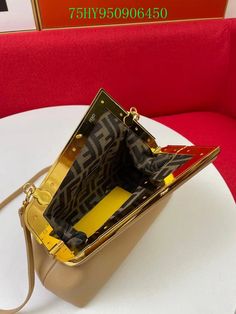 Size: 26cm*9.5cm*18cm It comes with Dust box, Care manual, Tag, and Paper bag. High-end Clutch With Dust Bag, High-end Box Bag With Gold-tone Hardware, High-end Gold-tone Pouch Box Bag, High-end Clutch Shoulder Bag For Shopping, High-end Gold Tote Box Bag, Designer Beige Baguette Bag In Pouch Shape, Chic Clutch Satchel, Designer Box Bag Clutch With Removable Pouch, Designer Box Clutch Bag With Removable Pouch