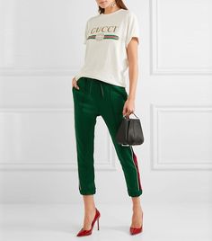 7 Fashion-Forward Ways to Wear Sweatpants This Week via @WhoWhatWear Adidas Street Style, Green Track Pants, Joggers Outfit Women, How To Wear Sweatpants, York Outfits, Gucci Adidas, Modern Womens Fashion