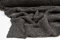 This beautiful wool jersey has a four way stretch! Stretch Merino Wool Sweater For Layering, Stretch Wool Fine Knit Sweater, Stretch Wool Sweater With Fine Knit, Stretch Wool Sweater In Fine Knit, Fine Knit Stretch Wool Sweater, Stretch Wool Sweater For Layering, Stretch Knit Sweater With Soft Texture, Cozy Stretch Knit Sweater, Gray Stretch Soft Knit Sweater