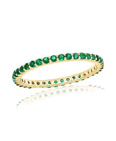 Emerald Stackable Band Ring in 14k Yellow Gold - Laura's Gems Classic Green Stackable Eternity Band, Fine Jewelry Green Round Eternity Band, Green Emerald Round Eternity Band, Green Emerald Eternity Band Round Shape, Green Round Eternity Band Fine Jewelry, Green Round Eternity Band In Fine Jewelry, Green Stackable Eternity Band For Promise, Green Emerald Stackable Rings With Round Band, Green Halo Ring With Round Band