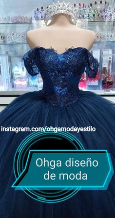 a dress on display in a store window with the words, ohga diseno de moda