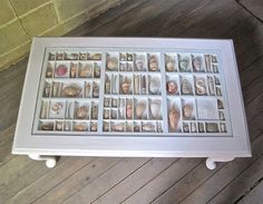 a white tray with pictures on it sitting on the floor