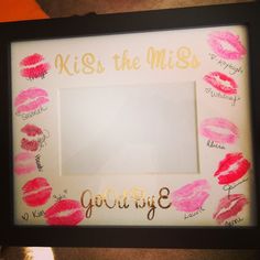 there is a picture frame that has lipstick on it and the words kiss the miss