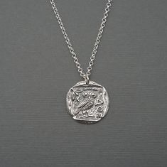 "Sterling silver Greek Athena Owl coin necklace on an sterling silver chain. The Athena Owl pendant is 3/4\" tall. This is a replica coin with the back of the pendant in antiqued texture. All jewelry is 925 solid sterling silver. Send a jewelry gift direct to friends and family with a free gift box and gift note. AOE in Ancient Greece means, \"of the Athenians\" Athena in greek mythology is the goddess of wisdom, courage and inspiration. Available in 16\", 18\" (model shown), 20\" MEN: This pend Greek Mythology Athena, Greek Athena, Athena Necklace, Athena Owl, Goddess Of Wisdom, Ancient Coin, Owl Gifts, Magical Jewelry, Greek Jewelry