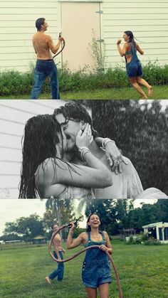 two people are standing in the grass and one is holding an umbrella while another person holds a hose