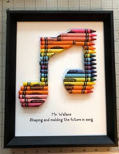 the letter f is made out of crayons and has a quote on it