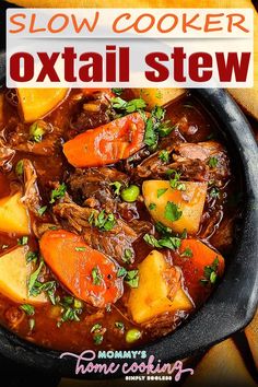 slow cooker oxtail stew in a black bowl with carrots and potatoes on the side