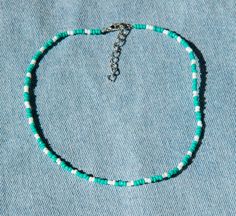 Pearl Seed Bead Necklace, Turquoise Choker With Round Beads For Summer, Summer Turquoise Choker With Colorful Beads, Casual Summer Beaded Necklaces With Spacer Beads, Summer Choker With Spacer And Round Beads, Beach Letter Beads Choker With Round Beads, Casual Turquoise Beaded Necklaces With Tiny Beads, Adjustable Letter Beads Choker, Casual Green Choker Jewelry