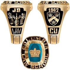 two gold rings with blue and black logos