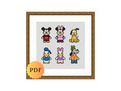 the cross stitch pattern for mickey mouse and friends is displayed in a wooden framed frame