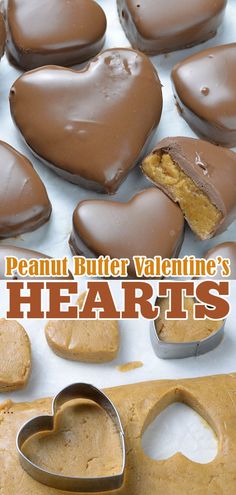 peanut butter valentine's heart shaped cookies on a baking sheet