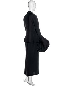 For Sale on 1stDibs - ▪ Yohji Yamamoto black silk suit skirt ▪ Single-breasted jacket ▪ Detachable voluminous padded cuffs ▪ Ankle-length skirt with back kick split ▪ SIZE JP Tailored Long Sleeve Sets For Evening, Black Long Sleeve Skirt Suit For Evening, Formal Black Long Sleeve Skirt Suit, Black Long Sleeve Skirt Suit For Formal Occasions, Elegant Black Skirt Suit For Evening, Tailored Silk Evening Sets, Classic Long Sleeve Evening Skirt Suit, Black Silk Long Sleeve Blazer, Black Silk Evening Suit