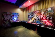 the room is decorated with graffiti and lights