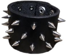 Punk Leather Cuff Wristband, Black Leather Punk Wristband, Punk Style Silver Leather Wristband, Edgy Leather Bracelets With Rivets, Edgy Leather Cuff Bracelet, Black Leather Bracelets With Studs, Adjustable Leather Wristband With Rivets, Punk Style Studded Leather Bracelet, Punk Leather Bracelet With Studs