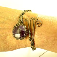 Women's Amethyst Crystal Silver Wire Wrapped Cuff - Bracelet - Handmade Artisan Jewelry Unique Handmade Amethyst Bracelets, Spiritual Wire Wrapped Crystal Bracelet As Gift, Artisan Purple Bracelet For Gift, Spiritual Hand Forged Cuff Bracelet Gift, Unique Adjustable Amethyst Bracelets, Hand Forged Adjustable Purple Jewelry, Bronze Wire Wrapped Bracelet For Gift, Adjustable Hand Forged Purple Jewelry, Spiritual Style Wire Wrapped Crystal Bracelet For Gift