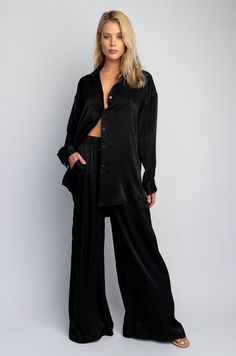 This is an image of Miley Set - RESA featuring a model wearing the dress Black Bottoms For Summer Nights, Black Summer Bottoms For Night, Chic Relaxed Fit Sleepwear For Lounging, Chic Black Tops For Night, Chic Sleepwear For Date Night In Spring, Denim Set, Dress Tight, Collared Blouse, Oversized Long Sleeve