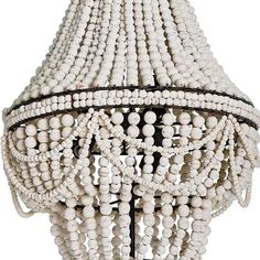 a white chandelier with beads hanging from it