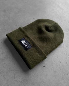 DESCRIPTION Cuffed beanie with GWAPS logo woven label Classic knit 100% acrylic, hypoallergenic 12" in length uncuffed Two colors available Olive Black STYLE: 122922 HDW ACR 1000 \ 122922 HDW ACR 5050 Olive Style, Cuffed Beanie, Black Olive, Logo Label, Woven Label, Woven Labels, Black Style, Black Fashion, Cuff