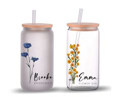 two glass tumblers with straw tops and flowers on the lids, one for bridesmaid