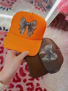 YALLLLL These are so cute for hunting season Snag one today  🦌 Orange or Brown 🤎 Direct To Film on Unbranded Hat 🍁 Turnaround Time 12-15 Business Days Camo Trucker Hat, Camo Hat, Hunting Hat, Camo Hats, Hat Ideas, Hunting Season, Pink Camo, Trucker Cap, Hats For Women