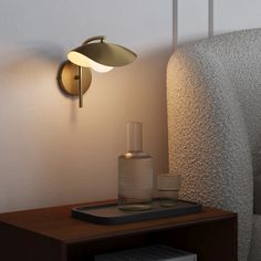 a lamp that is on the side of a wall