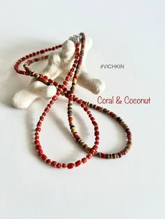 Beautiful coral and coconut natural  necklaces, made with 3-4m beads with a touch of the silver quality Czech glass seed beads. Get for yourself or gift to a friend. ♥   #vichkin #vichkindesign ↠ ABOUT    ▢  Size: about 15 inch, goes up to about 17 inch with chain extension.  ▢  Materials: 2mm quality Czech glass seed beads and 3-4mm coral beads and 4mm coconut beads.  ▢  This item is handmade and may vary slightly from the picture, making every one completely unique.  ▢  Ready to ship.  ↠ IMPOR Red Beaded Necklaces With Colorful Beads For Vacation, Red Beads For Beach And Summer, Red Round Beads Jewelry For Vacation, Red Beaded Necklaces For Summer Vacation, Red Heishi Beads Jewelry For The Beach, Coral Beaded Necklaces With Round Beads For Beach, Coral Beaded Necklace With Round Beads For Beach, Handmade Coral Beads For Beach, Red Gemstone Beads Necklaces For The Beach