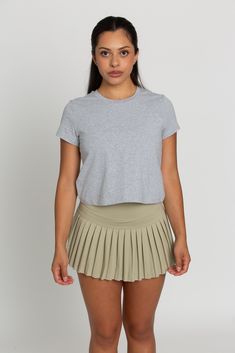 This Classic Short Sleeve is the essential tee that every woman needs. This tee has a simple cut that is semi fitted, making it both flattering and comfortable. It features capped sleeves, a round neckline and is the ultimate staple top. Sporty Fitted Everyday T-shirt, Casual Stretch Muscle Tee With Short Sleeves, Spring Athleisure Short Sleeve Muscle Tee, Fitted Short Sleeve Sporty Muscle Tee, Stretch Short Sleeve Muscle Tee For Everyday, Sporty Fitted Short Sleeve Muscle Tee, Fitted Cropped T-shirt For Everyday Casual Wear, Stretch Muscle Tee With Short Sleeves, Casual Fitted Cropped T-shirt For Everyday