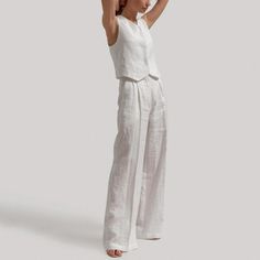 Discover Elegance and Comfort with Our Chic Summer Set Embrace the warmth of summer and the demands of a professional lifestyle with our Chic Cotton Linen Summer Vest & Pants Set. This beautifully tailored two-piece ensemble is the epitome of elegance and comfort, making it a must-have in your wardrobe. Whether it's for a day at the office or a casual outing, this set ensures you look effortlessly stylish and feel comfortable all day long. Product Features High Waist Design: Flatters your figure, providing a slimming and sophisticated silhouette. Pleated Front Style: Adds a touch of elegance and refinement to your look. Natural Fiber Composition: Made from high-quality cotton and linen, ensuring breathability and durability. Contemporary Office Lady Style: Perfectly blends professionalism Professional Lifestyle, Summer Vest, Sleeveless Suit, Straight Clothes, Linen Summer, Middle Aged Women, Office Fashion Women, Versatile Outfits, Summer Set