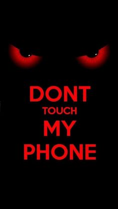 the words don't touch my phone are lit up with red eyes and dark background