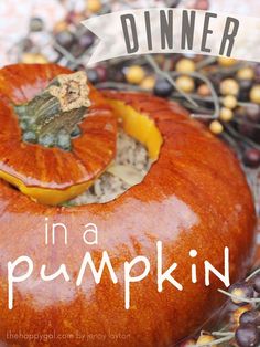 an orange pumpkin sitting on top of a table next to other fruits and vegetables with the words dinner in a pumpkin written above it