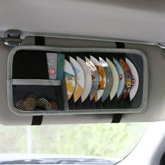 a bunch of surfboards are in the back seat of a car and it's storage compartment