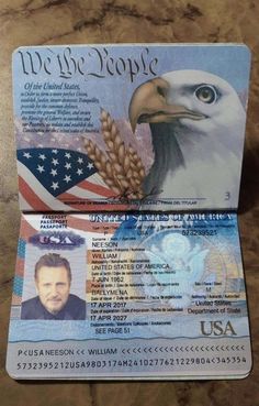 two id cards with an eagle and american flag on the front one has a visa card attached to it