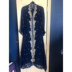 Navy Blue Chiffon Straight Shirt With Gold And Sequin Diamont Work On Color And Front . 3 Piece Suit Brand New Custom Made Size Small Navy Blue Chiffon Straight Shirt With Gold And Sequin Diamont Work On Color And Front . 3 Piece Suit (Slip, Dupatta, Trousers, Coat) Brand New Custom Made Size Small On Tag Measurements Laying Flat Shoulders 16in Arm Hole 8 In Sleeve Length 20 In Pit To Pit 18.5 In Waist 14.5 In Length 52.5 In Wide Trousers Length 39 In Blue Fitted Chiffon Sets, Blue Georgette Blouse For Summer, Elegant Blue Georgette Set, Elegant Blue Blouse For Eid, Blue Long Sleeve Georgette Sets, Summer Blue Chiffon Sets, Blue Georgette Long Sleeve Sets, Fitted Blue Georgette Blouse, Fitted Blue Chiffon Blouse