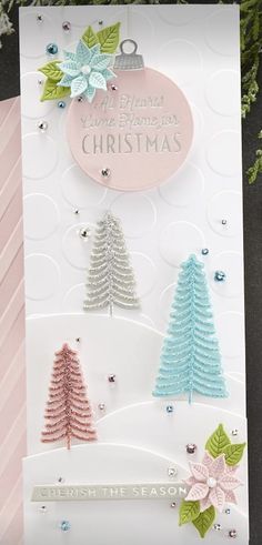 a card with christmas trees on it