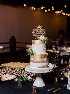 a wedding cake sitting on top of a table