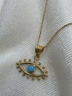 "ABOUT PRODUCT This 14K solid gold  Evil's Eye necklace is beautifully designed and hand crafted with our associates to make this a special gift for your loved ones. Knowing the value of our customers, We prepare each piece with extra care and attention.  ITEM DETAILS Material: 14K Gold Approx: 1.60 gram Available colors: Gold, Rose Gold, White Gold Available Sizes: 14\" to 20\" ✪ 14k Solid Gold ( Certification will be included with your order ) ✪Available 14K White, Yellow, Rose Gold (also in 1 Handmade Dainty Gold Turquoise Necklace, Dainty Handmade Gold Turquoise Necklace, Minimalist Gold Turquoise Necklace, Dainty Gold Turquoise Necklace As Gift, Gold Turquoise Gemstone Necklace In Dainty Style, Dainty Gold Turquoise Gemstone Necklace, Handmade 14k Gold Amulet Necklace, Dainty Turquoise Pendant Necklace, Dainty Turquoise Necklace For Gift