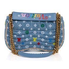 Guaranteed authentic Louis Vuitton New Wave Chain MM Bag. Introduced in Spring-Summer 2019 season.The bag comes in blue quilted LV denim with multicolored embroidered and tufted flowers and LV's. A versatile bag - can be carried as a top handle bag, a crossbody or a shoulder bag. Push lock with Gold hardware.Gold chain strap with shoulder strap pad.Removable top handle with multicolored embossed "Vuitton".Bold Gold logo plaque on front flap.Interior has 1 slot pocket.Comes with Louis Vuitton Sle Luxury Blue Quilted Bag, Designer Shoulder Bag With Embroidered Logo For Everyday, Luxury Blue Bag With Embroidered Logo, Luxury Blue Bags With Embroidered Logo, Casual Blue Shoulder Bag With Embroidered Logo, Designer Blue Denim Bags, Trendy Blue Quilted Bag, Designer Shoulder Bag For Spring, Louis Vuitton New