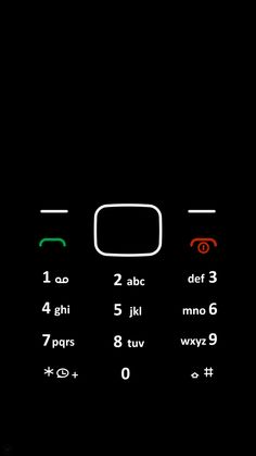 an old cell phone is shown in the dark with red and green numbers on it