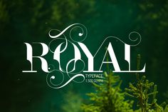 the royal typeface logo is displayed in front of some green plants and trees with white lettering